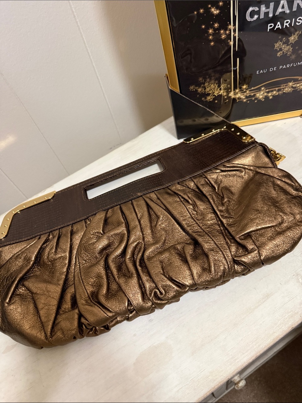 BCBGMAX Azria Bronze Metallic Pleated Wristlet Clutch with Gold Accents - Picture 6 of 11